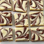 Decadent Nutella Swirled Cheesecake Bars Recipe 4 d46f201e 8389 4753 8963 f4c7f3ceed95 2